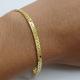 PULSEIRA LISA MEDIA FOLHEADA A OURO 18K - 21,5CM